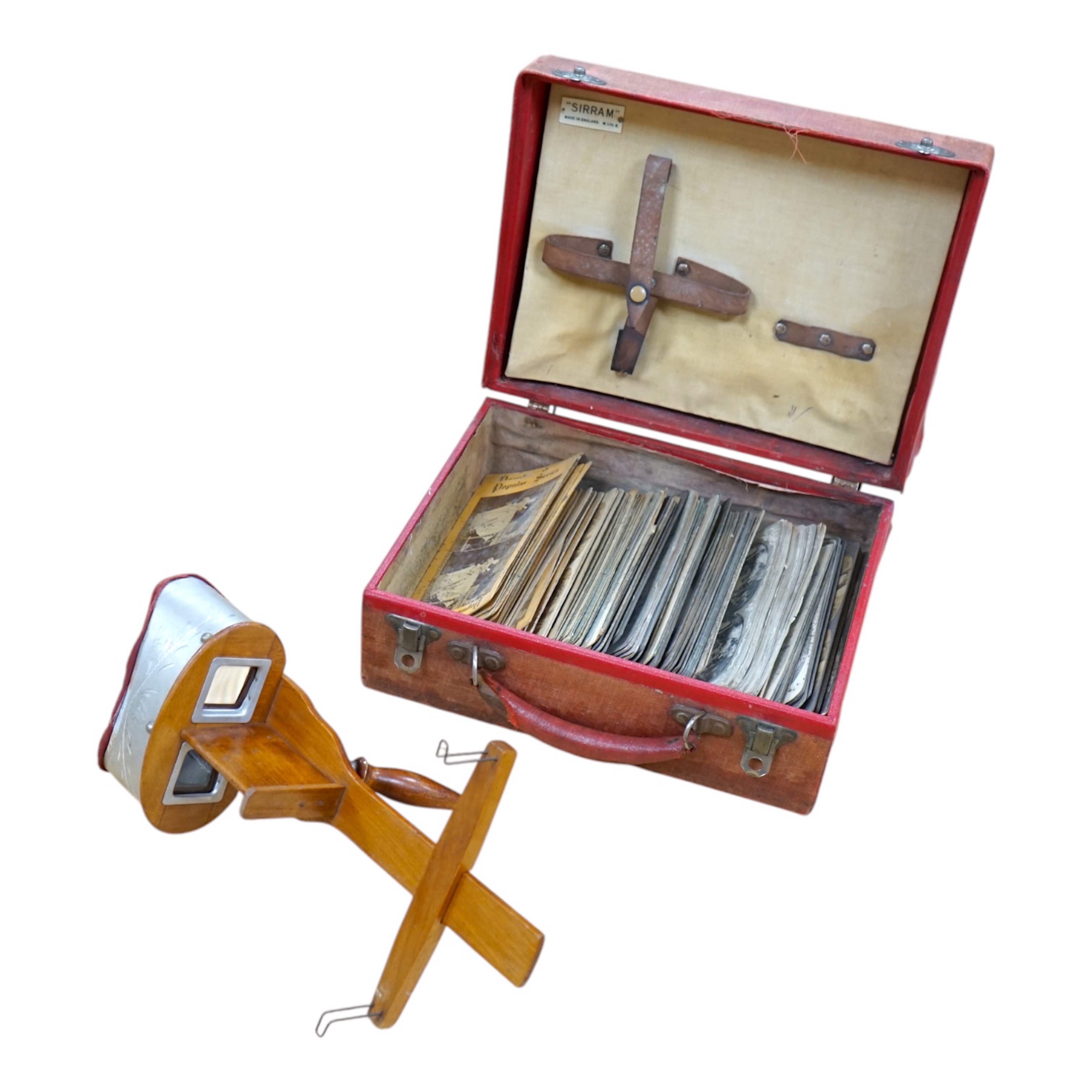 An R.K. White Co. stereoscopic viewer and a collection of slides, viewer 33cm long. Condition - cards have been damp at some point